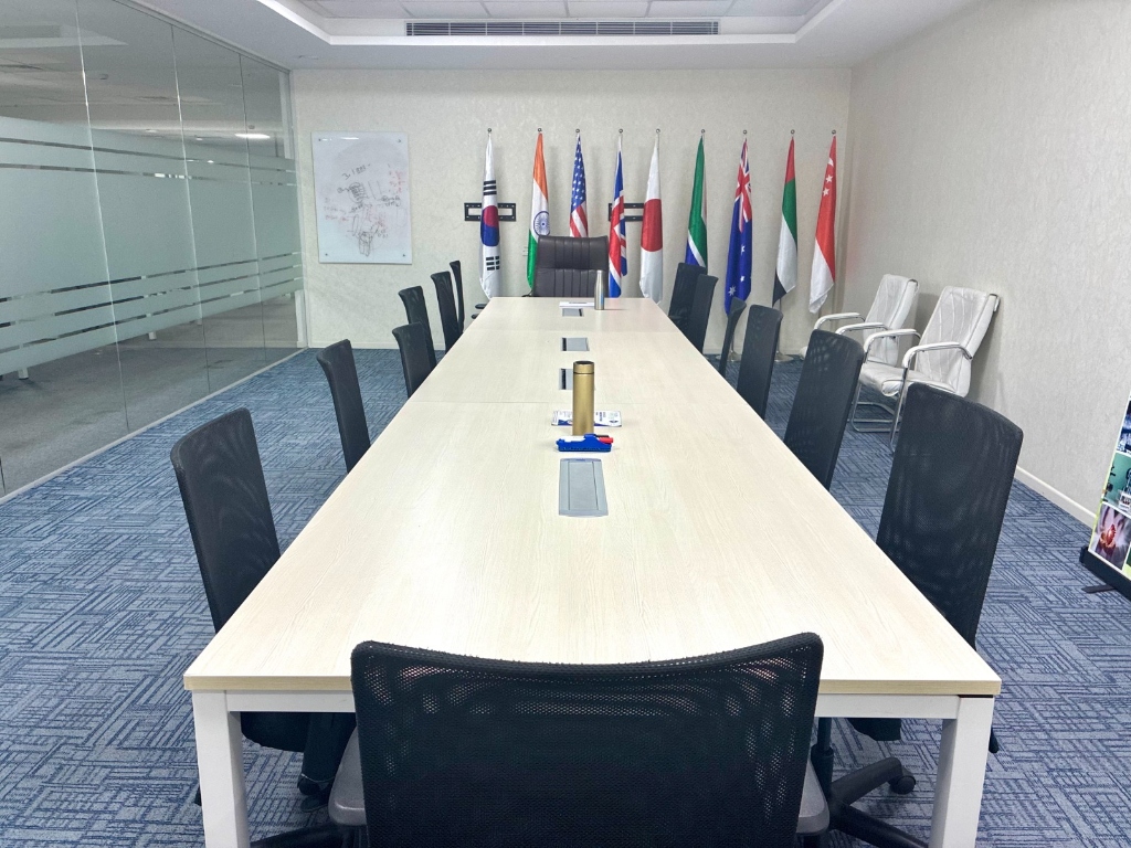 16-seat International Executive Boardroom with multinational flags
