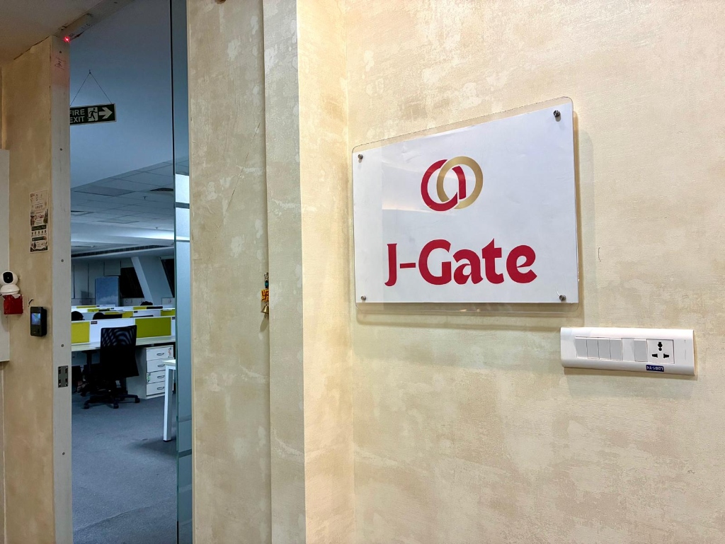 J-Gate official acrylic company signboard at the office door