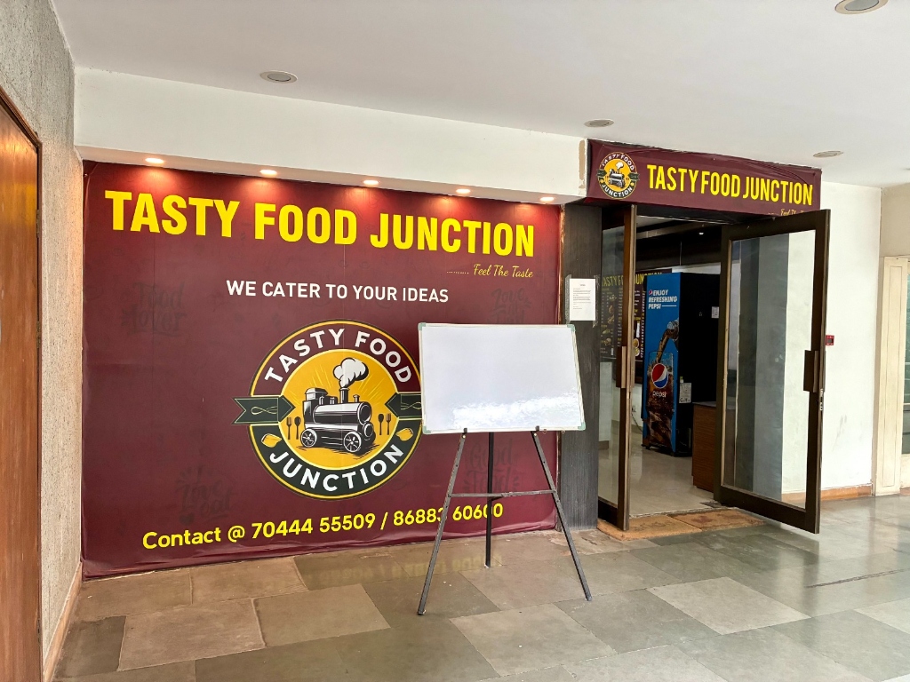 Tasty Food Junction entrance signboard