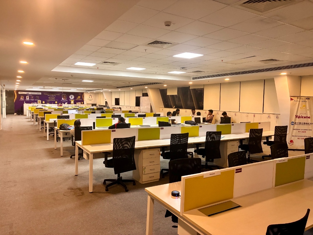J-Gate open workspace floor with 20+ dedicated workstations
